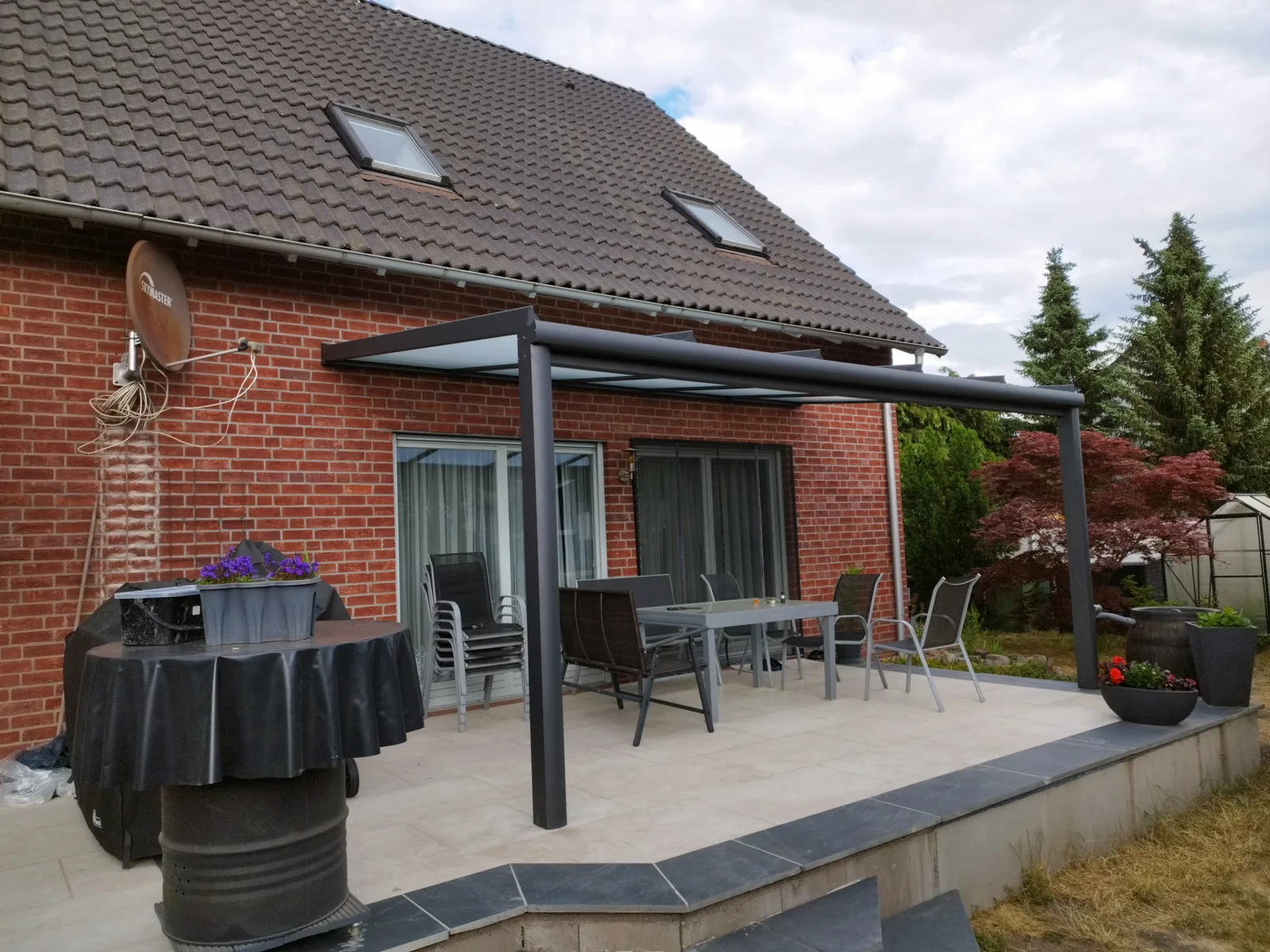 Terrassendach in DB 703 an der Klinkerfassade in Oranienburg